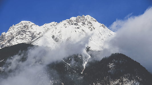 mountain alps under blue sky thumbnail
