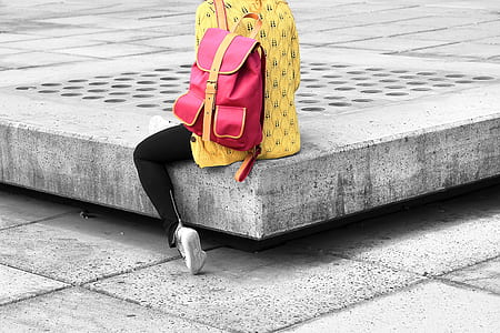 pink and yellow bag on floor thumbnail