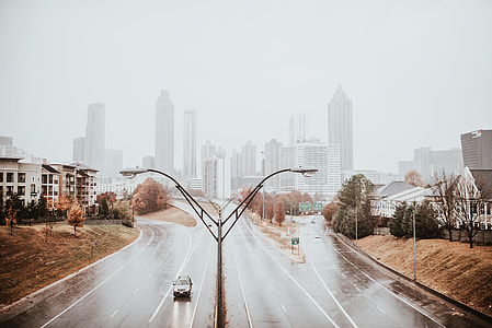 gray car on gray road during daytime thumbnail