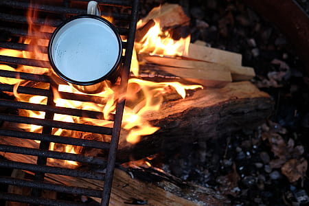 rec ceramic mug on black grill with open fire thumbnail