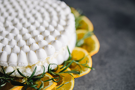 Meringue Cake with whipped cream and oranges thumbnail