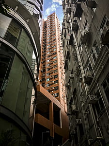 low angle photography of brown building thumbnail