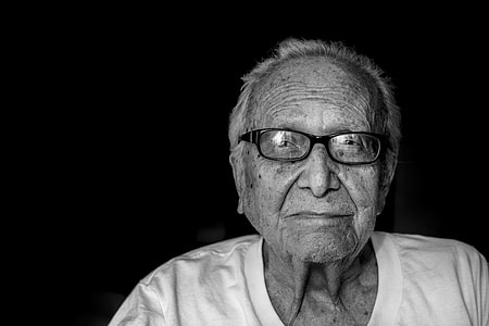 grayscale photo of man in white shirt wearing eyeglasses thumbnail