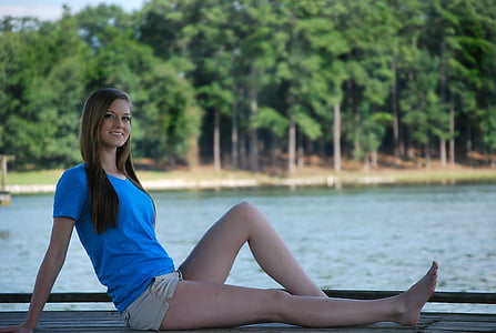 woman in blue shirt sitting thumbnail