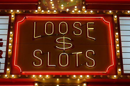 red and brown LED light Loose $ Slots signage thumbnail
