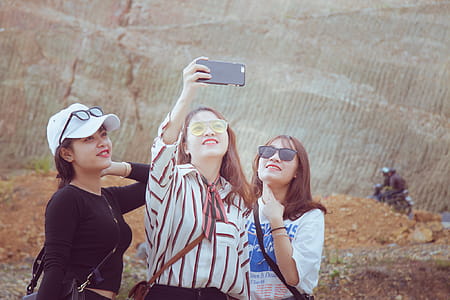 Three Woman Doing Some Selfie thumbnail