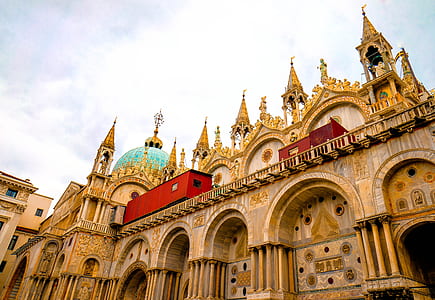 low-angle photo of gold concrete museum thumbnail