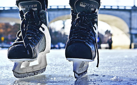 selective focus photography of black Intruder skate shoes thumbnail