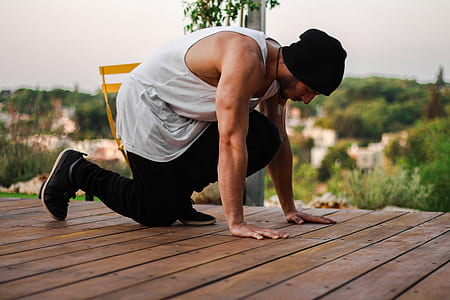 man wearing tank top thumbnail