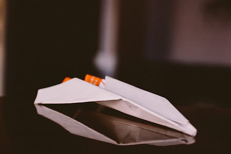 white paper plane toy thumbnail