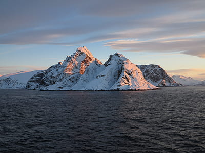 snow-covered mountain at daytime thumbnail