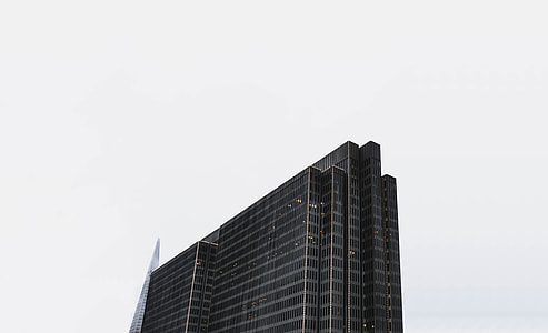 low-angle photography of high-rise building under clear sky thumbnail