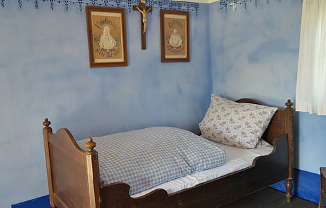 brown mattress on brown wooden bed frame thumbnail