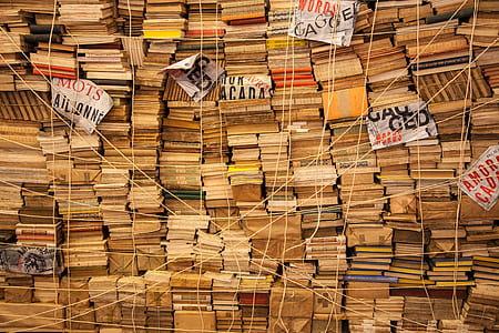 piled books with strings thumbnail