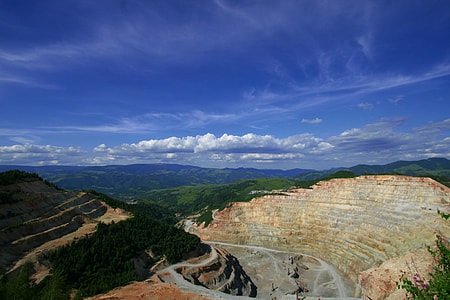 aerial photo of brown and green mountain at daytime thumbnail