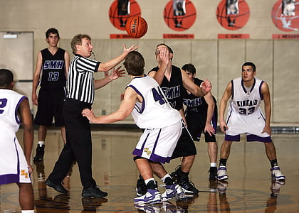 two basketball players about to jumpball thumbnail