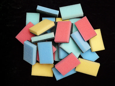 pile of sponges placed on black surface thumbnail