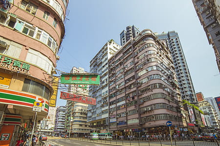 Group of People Near Road and Buildings thumbnail
