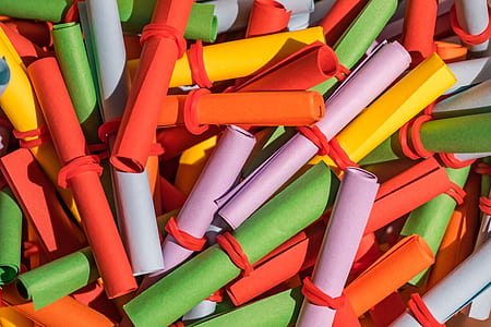 closeup photo of assorted-color rolled papers thumbnail