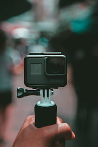 focused photo of a black GoPRO thumbnail