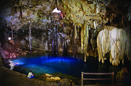 person sitting inside cave thumbnail