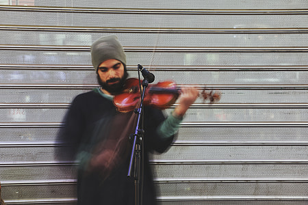 man wearing black shirt playing violin thumbnail