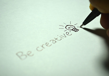 person drawing light bulb illustration thumbnail