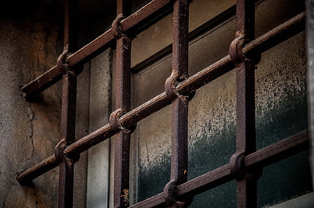 brown metal window grill photo thumbnail