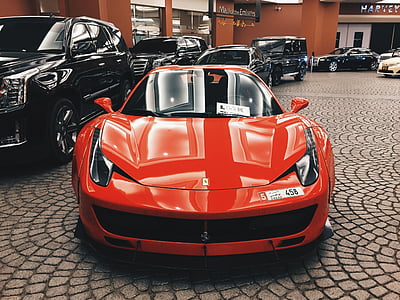 orange sports coupe thumbnail
