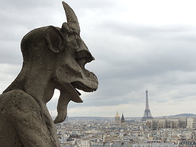 gargoyle under cloudy daytime thumbnail