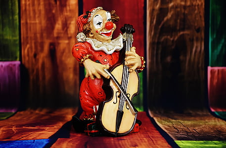 clown holding cello thumbnail