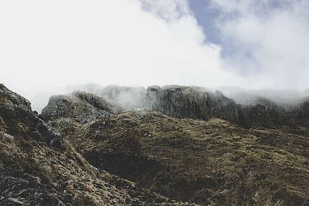 landscape photography of mountain covered with fog thumbnail