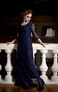 woman in blue dress posing for picture thumbnail