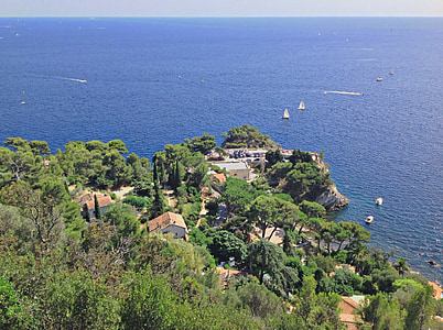 aerial photo of island with houses thumbnail