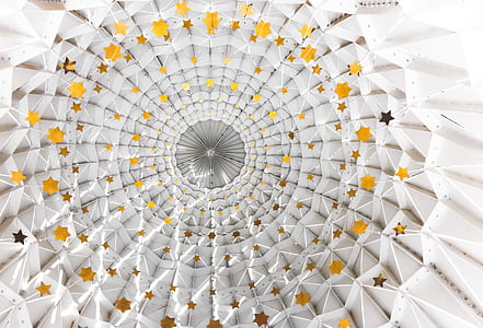 architectural photography of white and yellow star print ceiling thumbnail