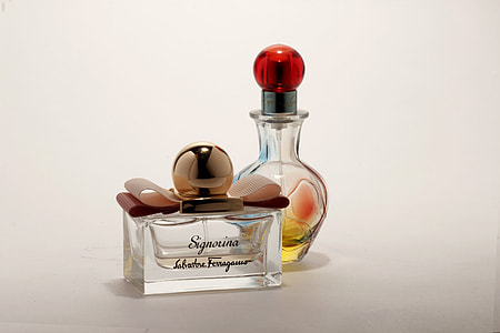 two glass bottles on surface thumbnail