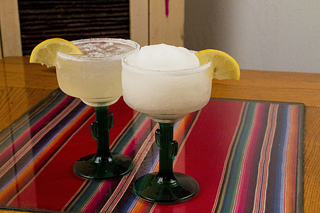 two martini glasses on top of table thumbnail