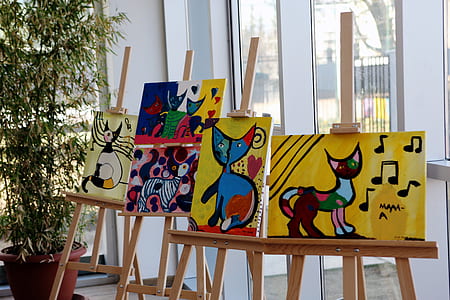five cat paintings with easels thumbnail