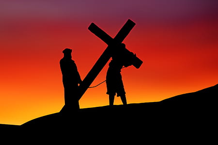 silhouette photo of Jesus Christ image holding cross thumbnail