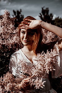 Woman In Flower Blossoms Photo thumbnail