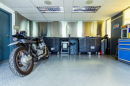 black standard motorcycle park inside building thumbnail