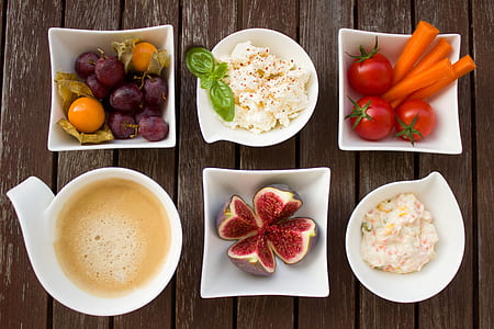 six white ceramic bowls filled with assorted dishes thumbnail