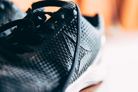 closeup photo of black Dainese low-top shoe thumbnail