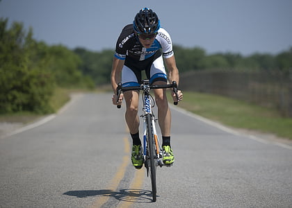 man riding road bike in the highway thumbnail