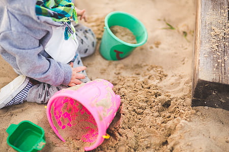 Little boy playing in the sand thumbnail
