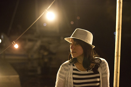 woman in white and black striped shirt thumbnail