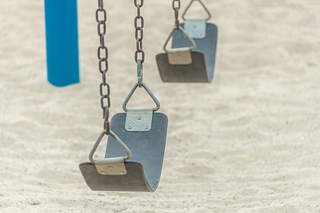 two black swing playground thumbnail
