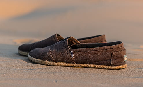 pair of gray Toms shoes thumbnail