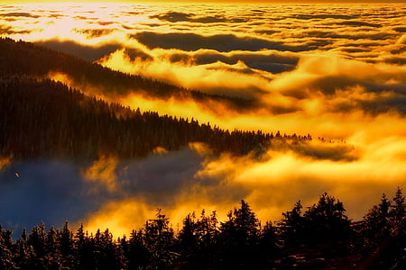 aerial photo of mountains with clouds during sunset thumbnail