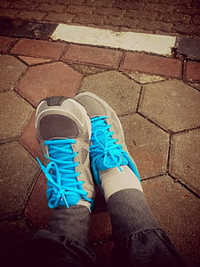 pair of gray-and-blue running shoes thumbnail